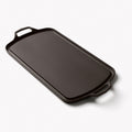 Angled view of the Field Company Long Griddle with a cast loop handle at each end thumbnail