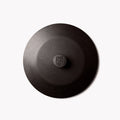 Field Dutch oven lid seen from above, gently domed with a shield medallion knob thumbnail